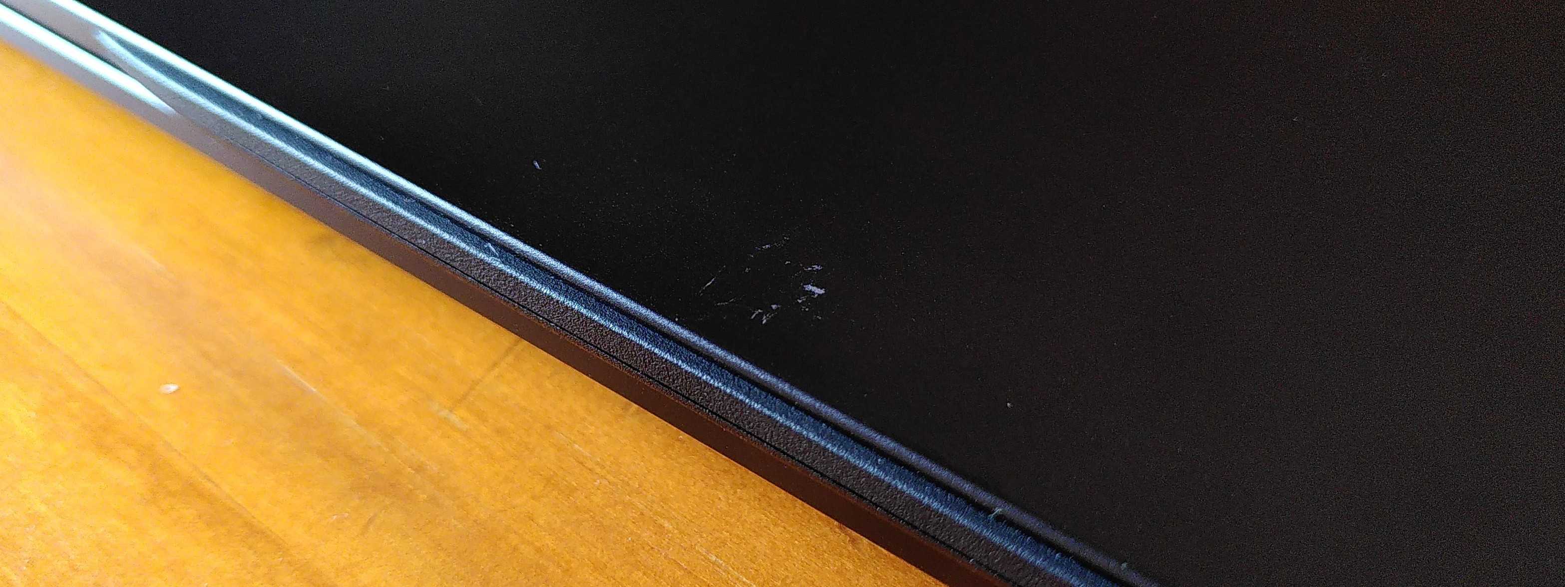 Tuxedo InfinityBook scratched
